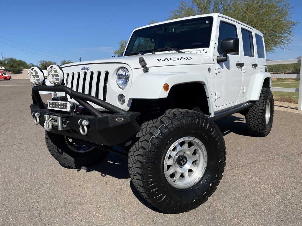 #323 - 2015 Jeep Wrangler UNLIMITED MOAB | MAG Auctions